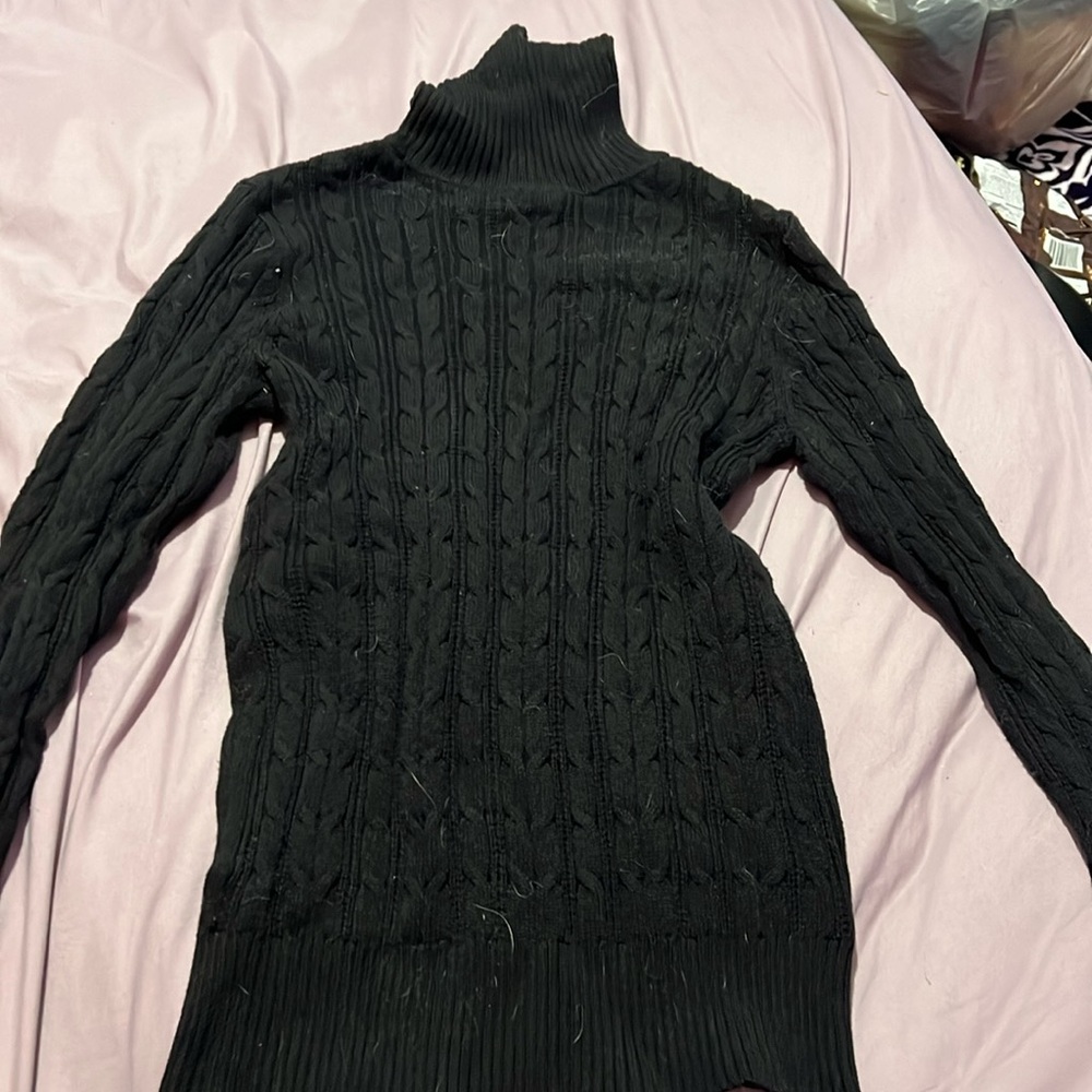 Black knitted turtleneck sweater